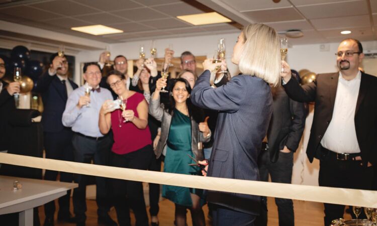 Vendavo Team Members Collaborating In A Modern office Environment